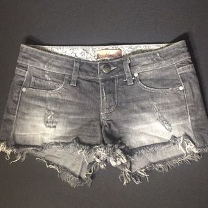 Paige Denim Distressed Black Denim Shorts